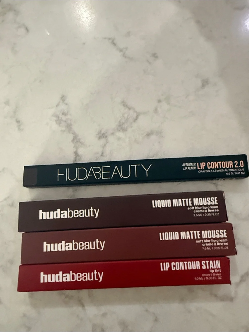Huda liquid mousse 2 Huda lip contour 1 Huda lip contour stain 1